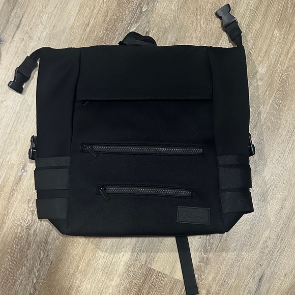 Black Multipocket neoprene baby diaper bag. Comes with extra bag / changing mat